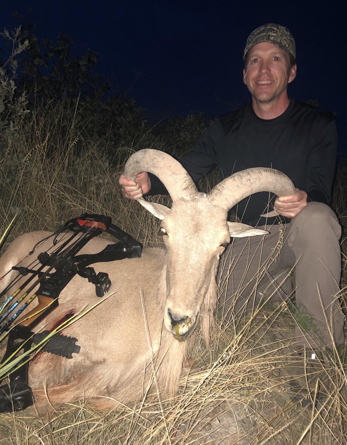 John with an aoudad ram, bow hunt