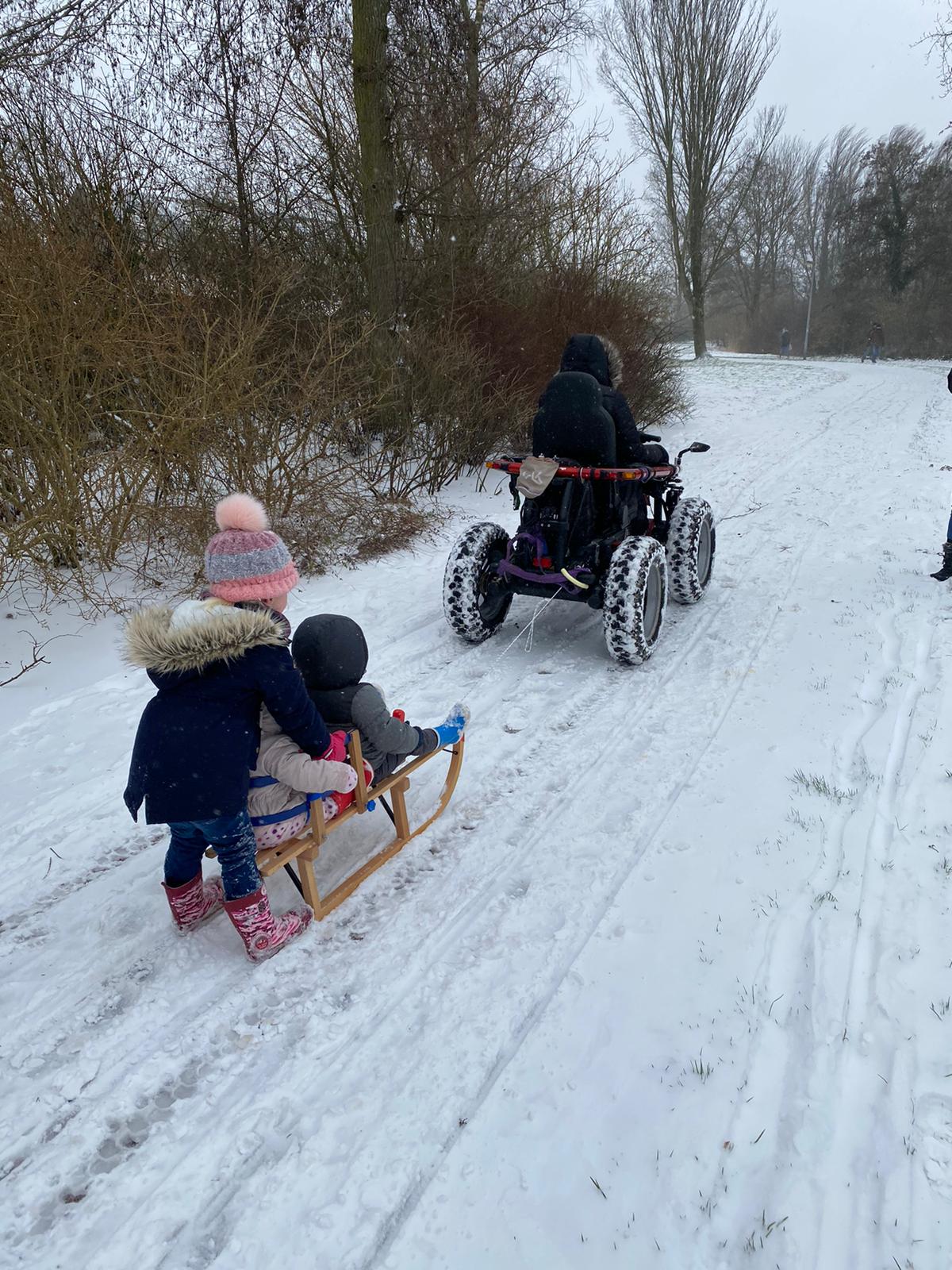 Snowy Park Sled Pull