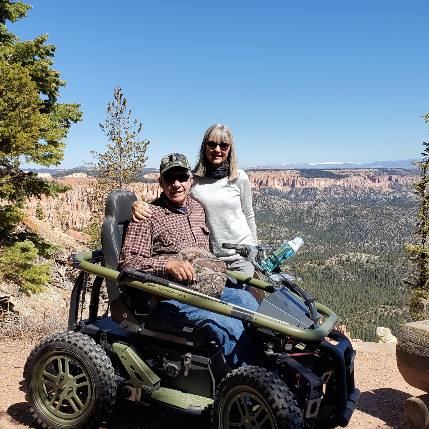 TerrainHopper rider at Bryce Canyon overlook with family